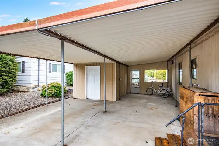 Spacious carport provides sheltered entry, keeping you comfortable and dry all year round.