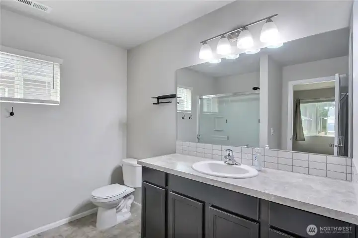 Primary bedroom ensuite bathroom.