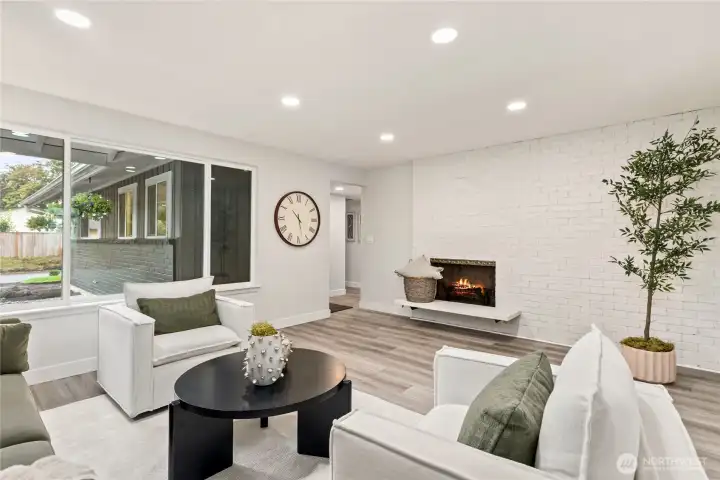 Spacious Formal Living Room! Stunning natural light throughout gorgeous picture windows!