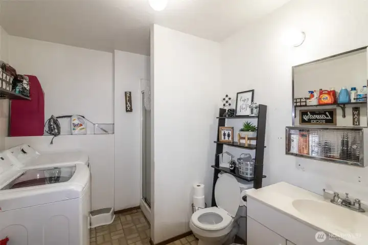 Utility room/ 3/4 bathroom.