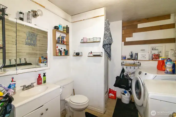 3/4 bath and utility room downstairs