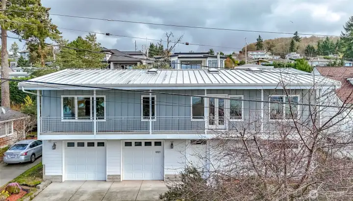 View of metal roof, skylights and metal siding