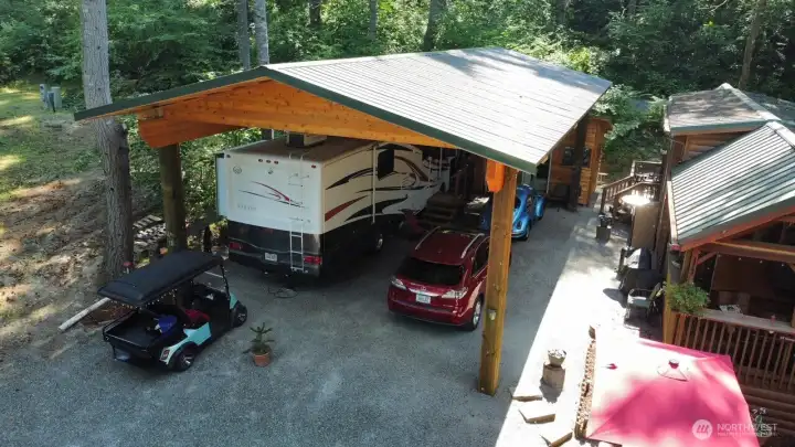 COVER IS LARGER ENOUGH TO PARK 2 CARS UNDER THE COVER