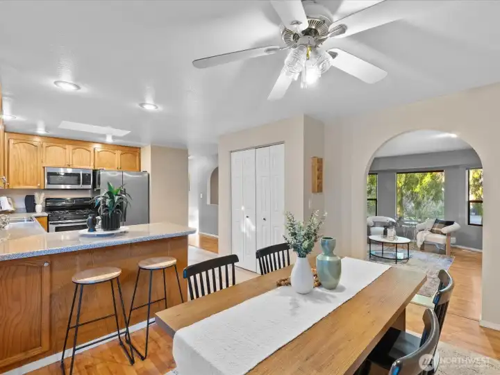 The kitchen features this breakfast bar and the large pantry.