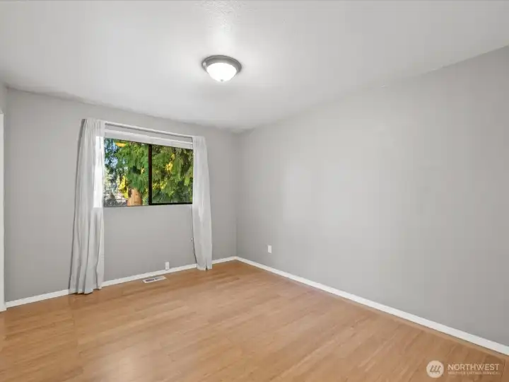 Each of the two additional bedrooms is good sized, with large closets.