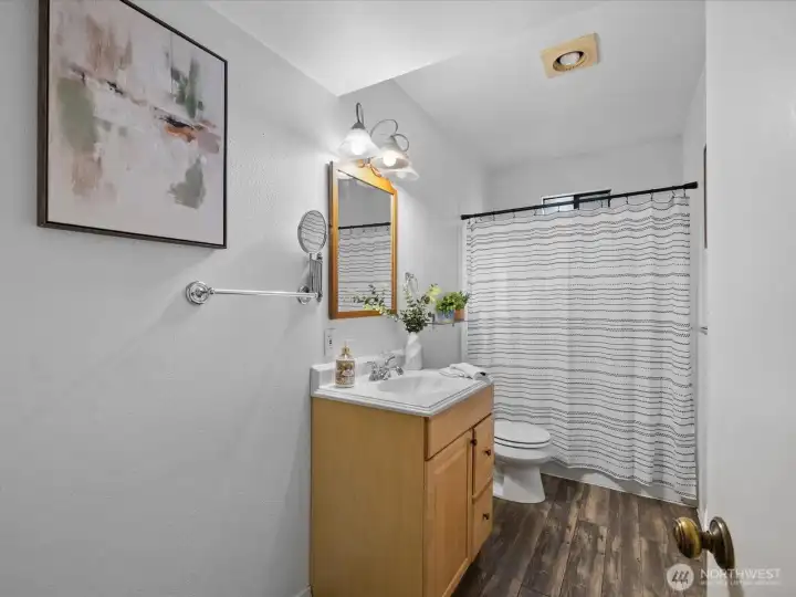 This full bath on the lower level is great for guests or when you're working in the garage.