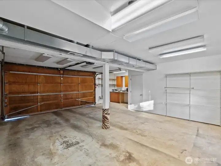 There is welcome shop space in the garage, ready for your projects.