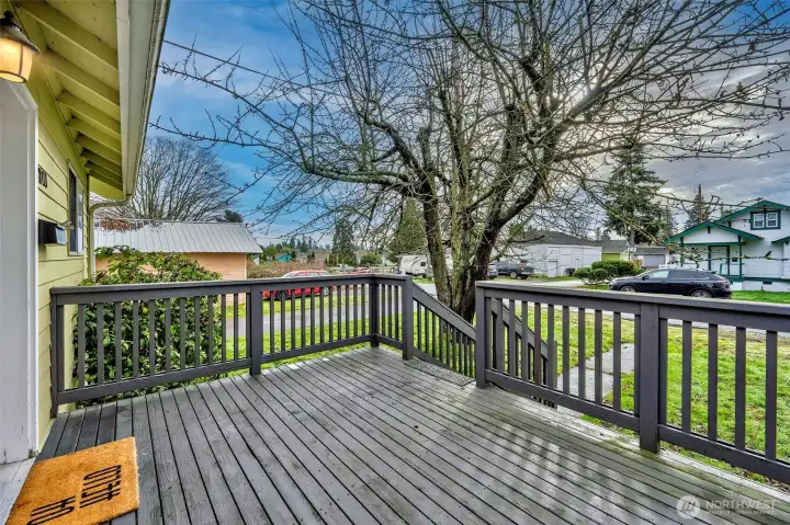 Room to enjoy a cup of coffee on the front deck with a mountain view in the distance