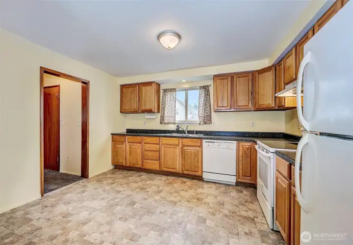 Kitchen with room to add more cabinetry or a small table and chairs