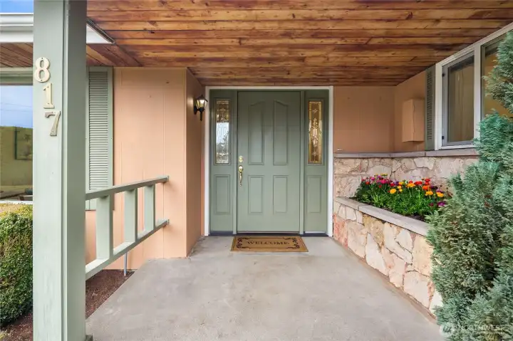 Covered front porch entrance to main level