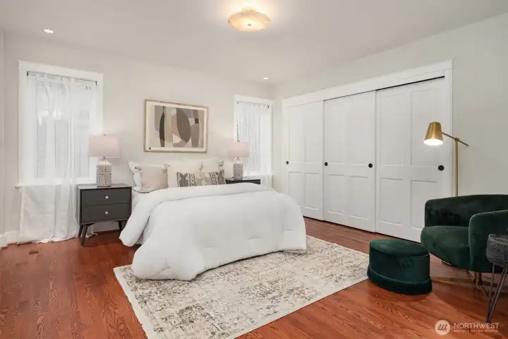 Primary Bedroom on this level is a spacious retreat with all the amenities needed for a relaxing and rejuvenating atmosphere.  Make life simple with lighted closet organizers. In-spa bath with glass enclosed steam shower, free standing bathtub, heated floors and towel rack, dual sinks and plenty of cabinet space. High quality Kohler fixtures, mosaic marble, pewter sconces, hand rubbed antique brass, dual Robern medicine cabinets.