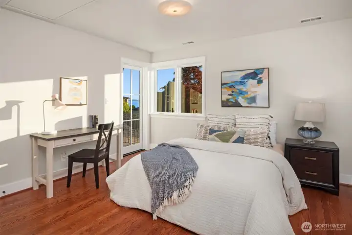 Upper level has second primary ensuite with view of Seattle skyline,  Mt Rainier and Puget sound.