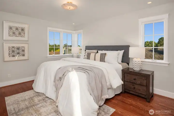 Three luxurious bedrooms upstairs, each with its own ensuite bath and deck with inspiring views.  All bedrooms include lighted closets with built-in organizers for maximum functionality.