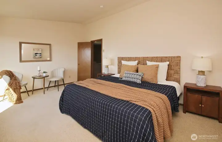 Main Primary Bedroom has view of water out the window