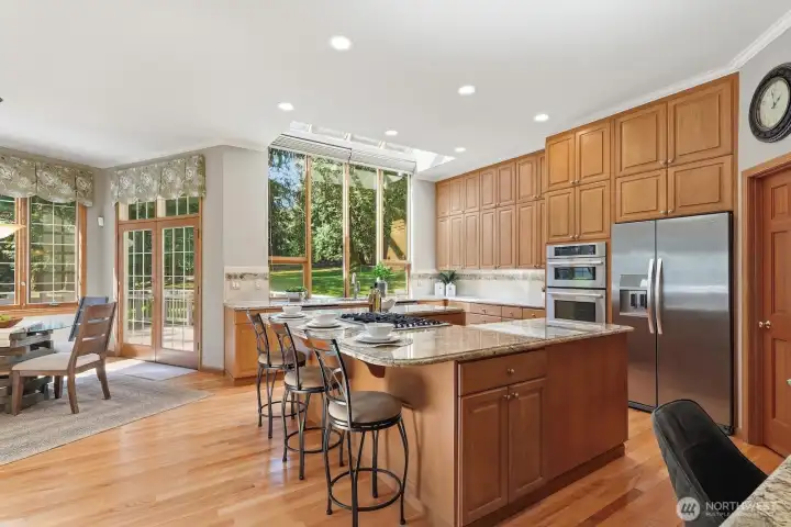 The gourmet kitchen features a circular layout to allow the chef interaction with those nearby.