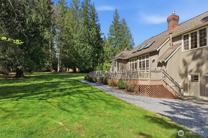 Ensures room for all sorts of play and features evergreens, flowering plants and scrub and sprinkler system.