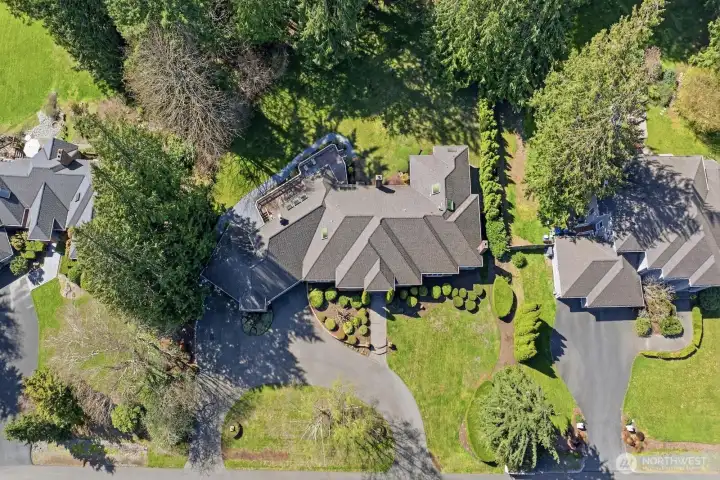 Two HVAC systems, including air conditioning ensure year-round climate comfort. Dual hot water heaters with recirculating systems add efficiency and convenience.