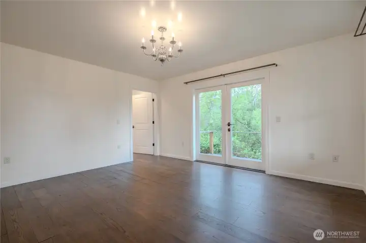 Bedroom on main with walkout to view