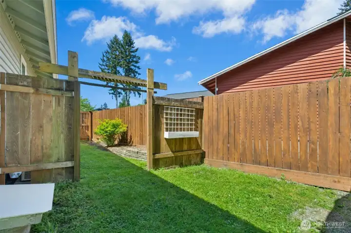 Other side yard with gate to front yard.