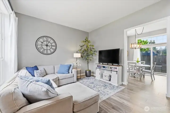 High ceiling and room for oversized furnishings creates a special place for gatherings and entertaining!