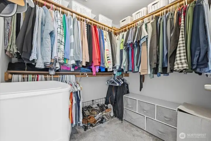 Walk-in closet with storage for year round seasonal clothing!