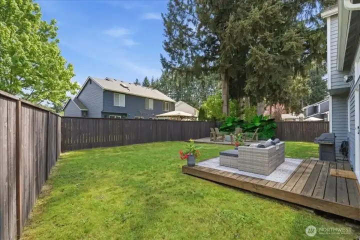 Deck area  for relaxing, barbecuing or contemplating possibilities for this level enclosed space!