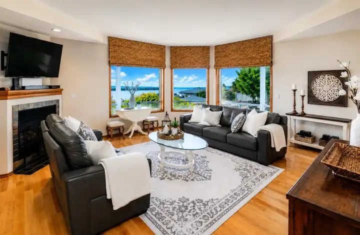 Spacious family room with oversized windows that capture the amazing view.