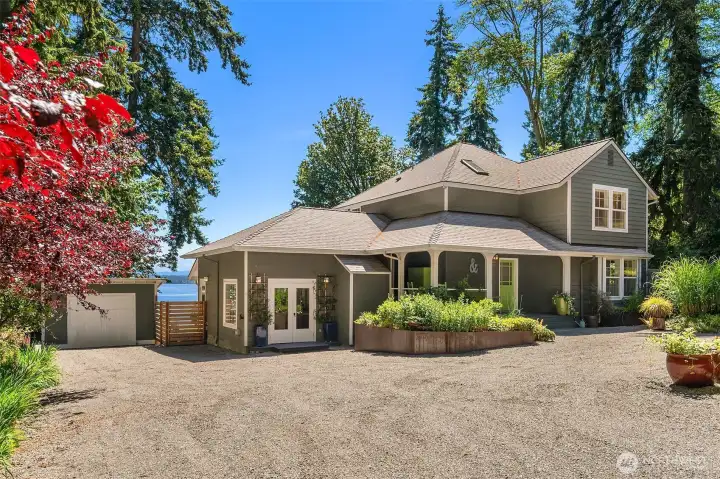 Fresh gravel driveway with EV charging and plenty of parking. Fresh gravel driveway with EV charging and plenty of parking.