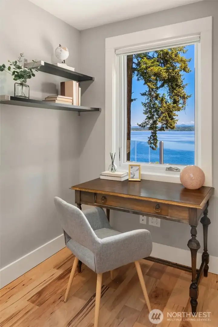 An office or nursery adjoins the primary suite. An office or nursery adjoins the primary suite.