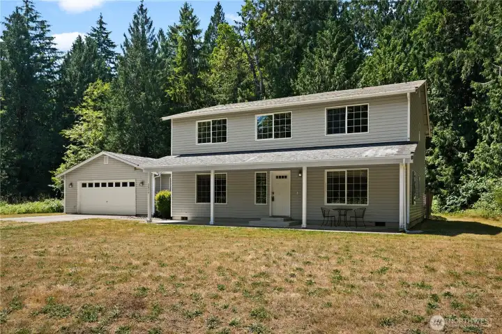 Another look. Trees in the back keep the hot sun from baking the house. In back of the trees is a private lake. Another look. Trees in the back keep the hot sun from baking the house. In back of the trees is a private lake.