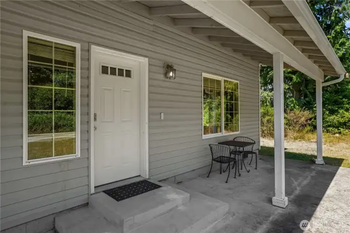 Covered front porch the length of the house. Nice shielding from the weather elements. Covered front porch the length of the house. Nice shielding from the weather elements.