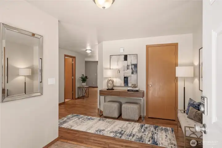 Virtually staged... Spacious entry with front closet, living room and dining room on either side Virtually staged... Spacious entry with front closet, living room and dining room on either side