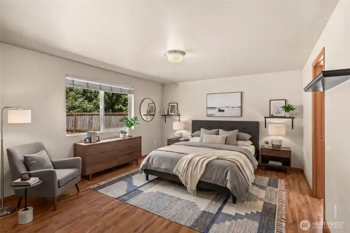 The primary bedroom is on the main floor. It is large, as you can see. Virtually staged! The primary bedroom is on the main floor. It is large, as you can see. Virtually staged!