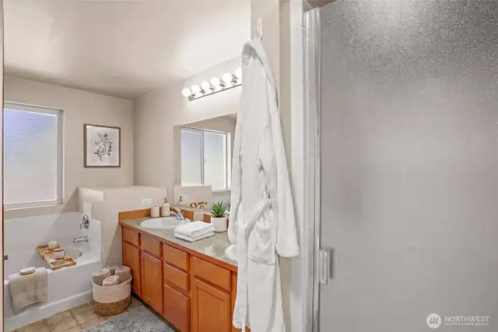 Primary suite bathroom with double sinks. Virtually staged. Primary suite bathroom with double sinks. Virtually staged.
