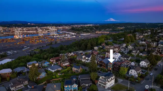 Mt. Rainier is in the distance and can be seen from the top floor of the home.