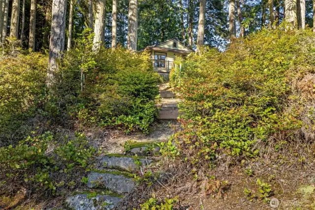 Stitched together by charming pathways, this heirloom property offers versatility and plenty of elbow room.