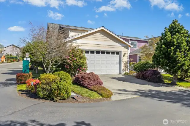 The attached two-car garage enhances both privacy and curb appeal, with convenient access from picturesque Whimbrel Street or the quiet rear lane. Generous in size, it also provides ample space for storage and everyday ease.
