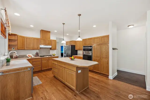 Abundant storage options integrated throughout the space that keep kitchen essentials organized and easily accessible.