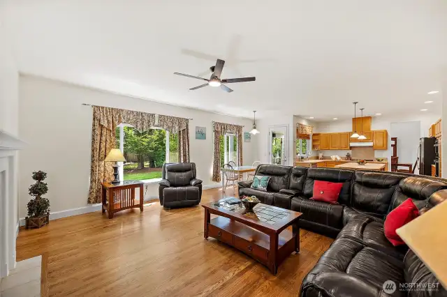 Expansive family room, also flows to covered deck that extends your living area into nature where you can enjoy your morning coffee or evening glass of wine.