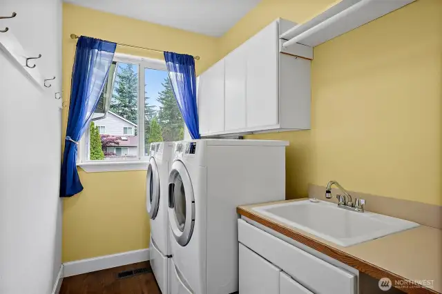 Utility room with storage and large basin
