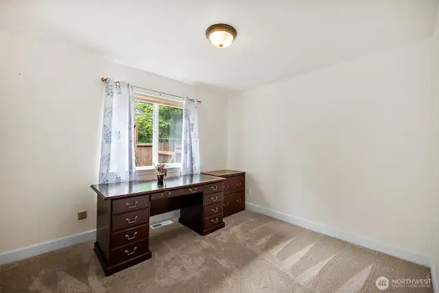 Nice sized bedroom 3 that also includes double door closet and cubby area for book shelf
