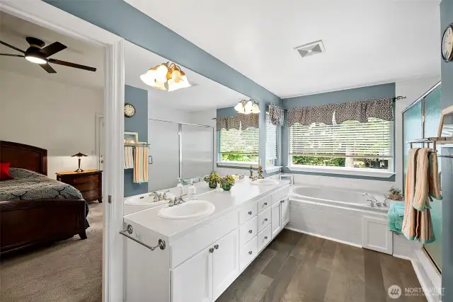 Ensuite bath with dual vanity and jacuzzi tub.