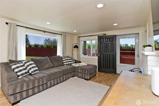 The living room also opens into the side yard for easy convenience.