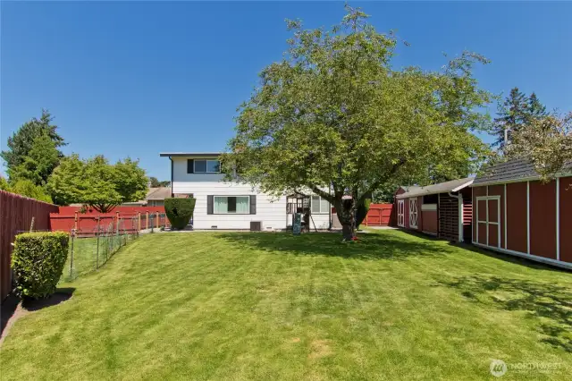 Large corner lot is meticulously maintained!