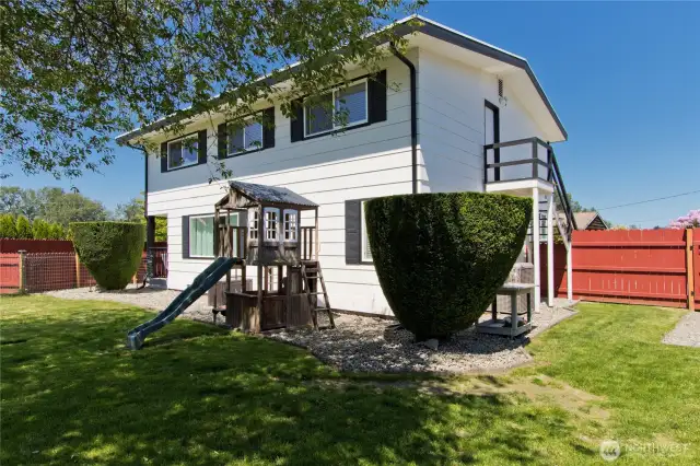 Back of home offers plenty of shade for the play area.