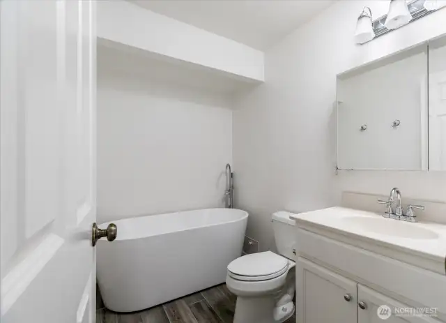 Hall bathroom with soaking tub