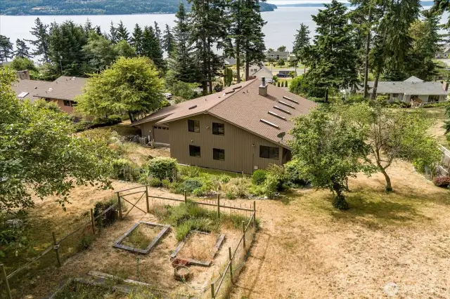 Back view of home and property
