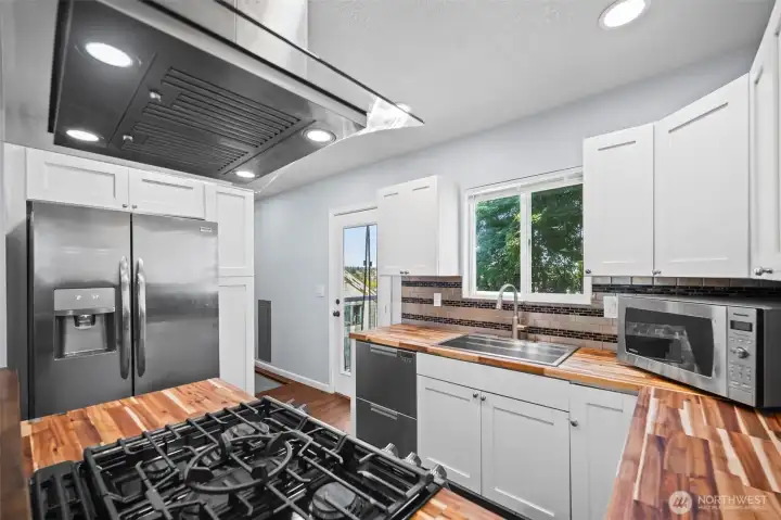 Around the corner you'll find stairs to the fully finished basement.