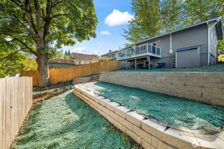 The property goes well beyond the fence to the alley!