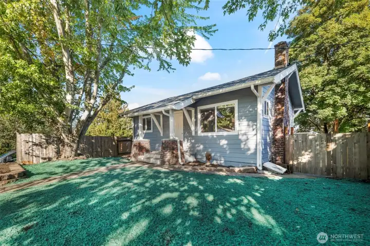 So much more than meets the eye with this sweet home on a beautiful street.